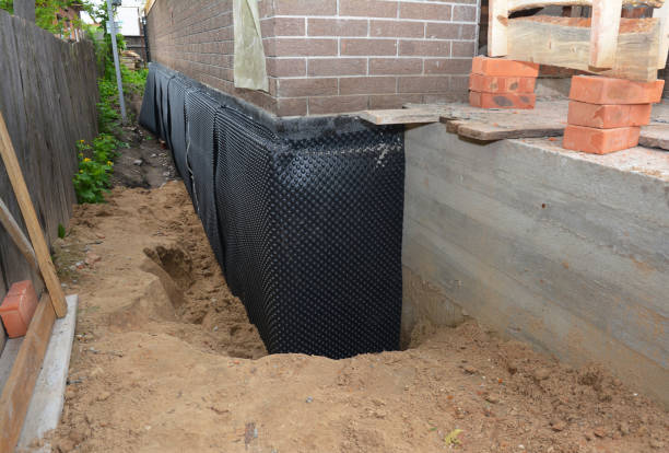 SJ Waterproofing Pros technician performing targeted Emergency Waterproofing assessment in Summit, WA